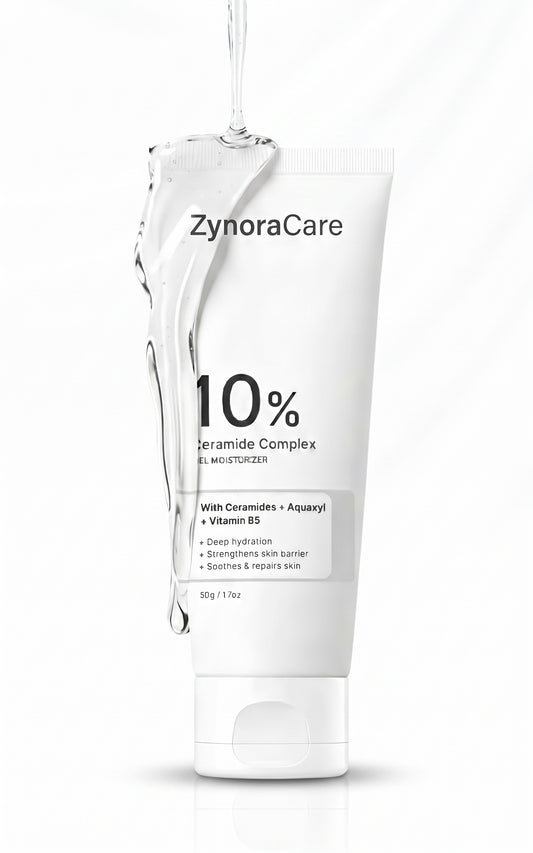 ZynoraCare 10% Ceramide Complex Gel Moisturizer in a white squeeze tube, shown with a clear liquid droplet dripping down the front against a white background.