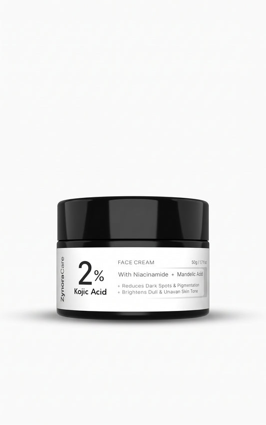 A black jar of ZynoreCare 2% Kojic Acid Face Cream with a white label, centered on a light gray background.